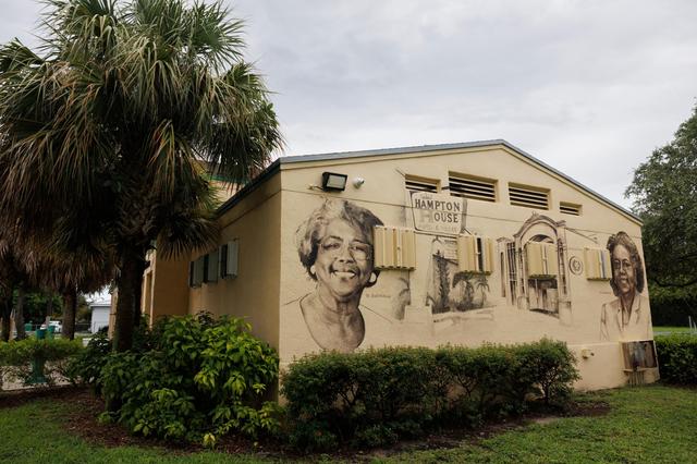 A moral of neighborhood historical figures sits in Jefferson Reaves, Sr. Park on Wednesday, July 23, 2025 in the Brownsville neighborhood of Miami, Fla.
